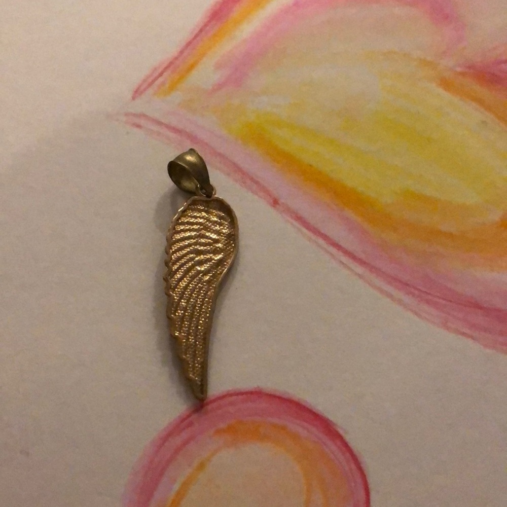 10k Angel wing pendant, approximately 1.5 inches.